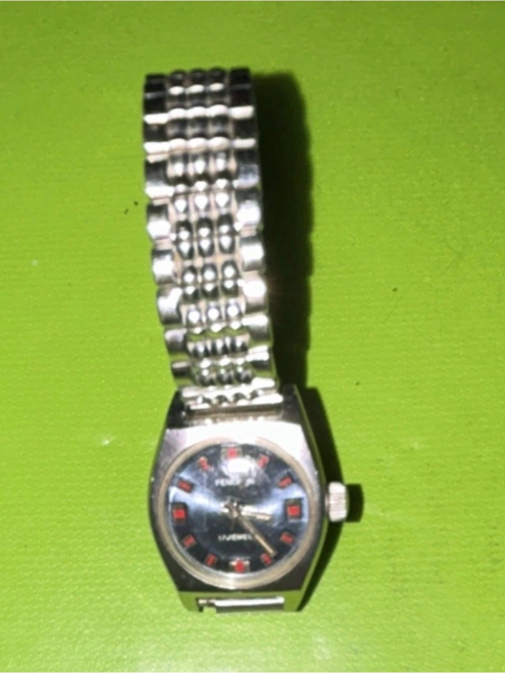 Vintage Stainless Steel Wristwatch with Black Dial and Red Accents
